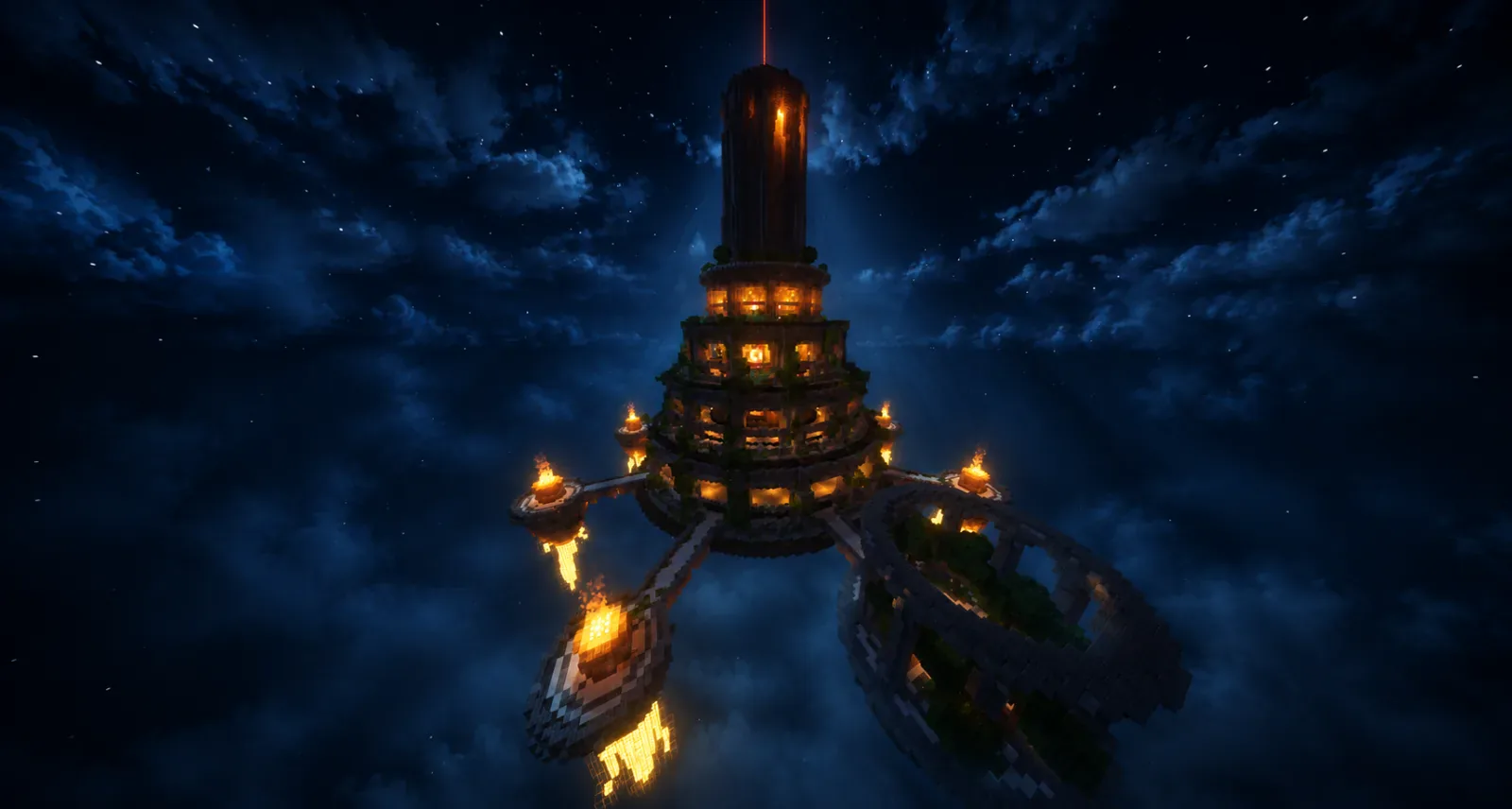 The spire rising above the cloud line at night, beacon lit
